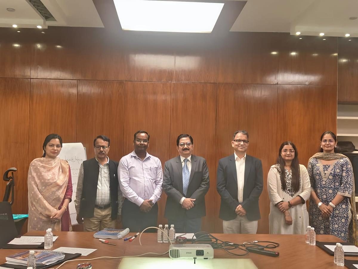 Faculty and participants after a session